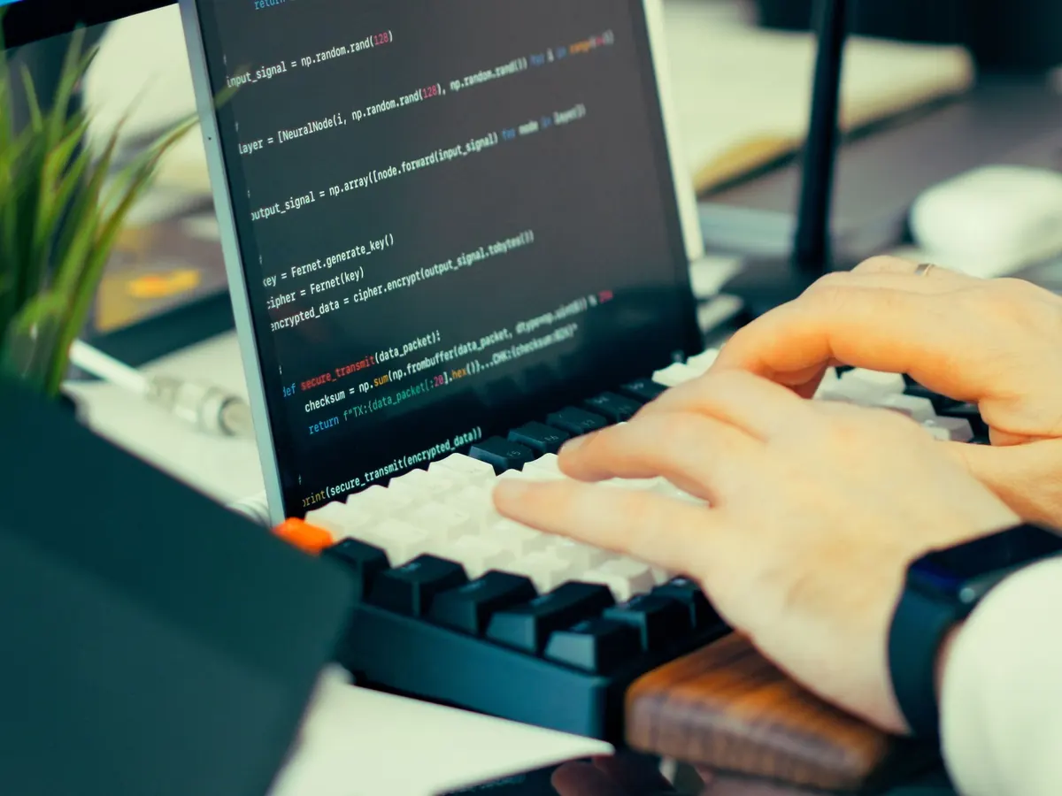A developer typing tests at a keyboard